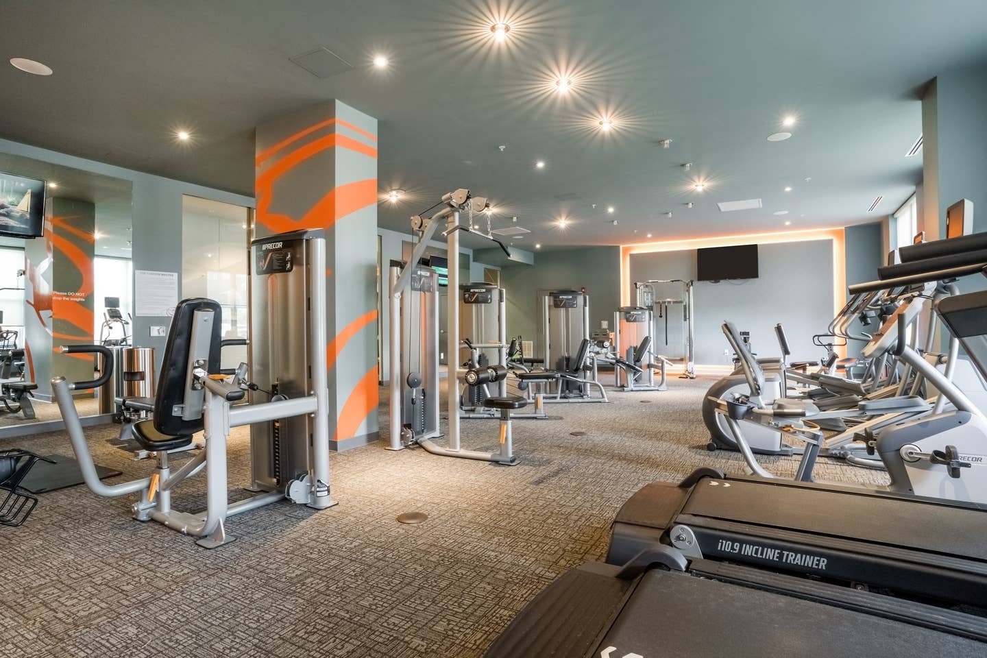 Fitness center with different styles of gym equipment